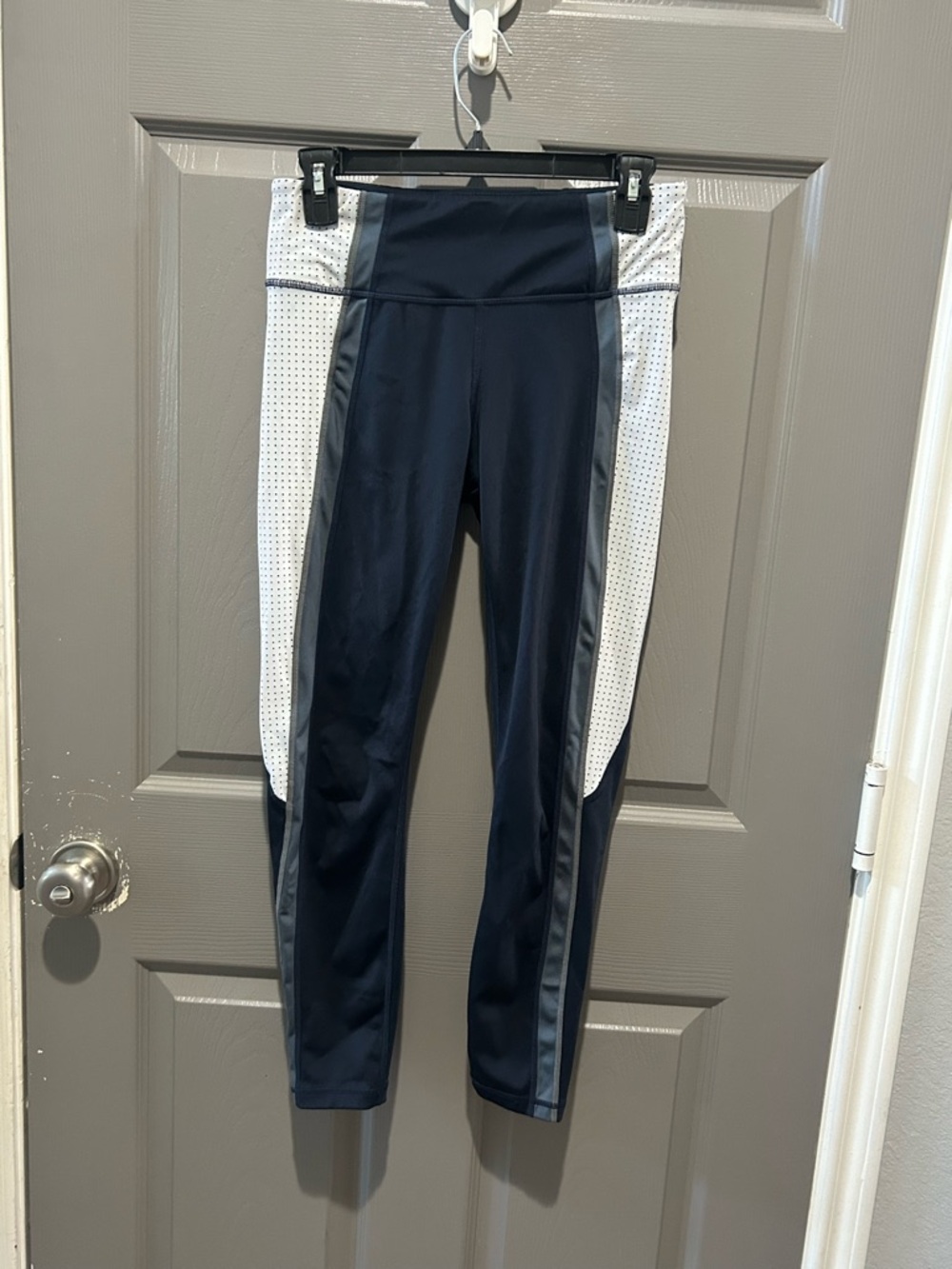 Athleta Navy Leggings with White Perforated Side Panels